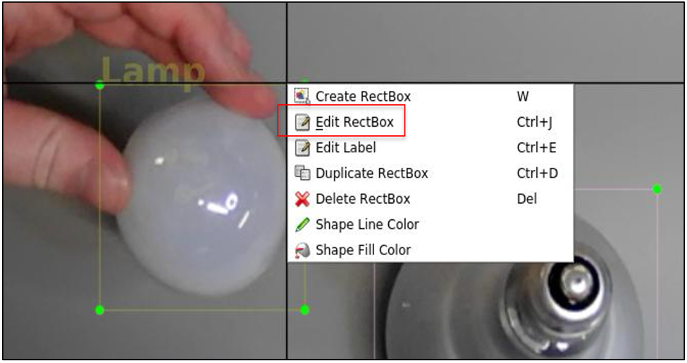 A hand holding a light bulb Description automatically generated